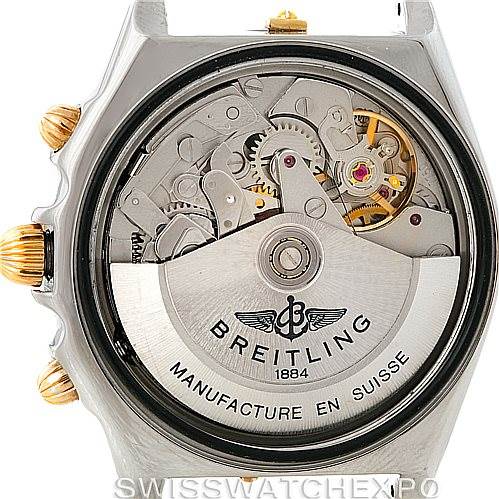 The image shows the back view of the Breitling Chronomat B13050 Men's Steel and Gold (two tone) Black Dial B13050 Men's Steel and Gold (two tone) Black Dial watch, highlighting the inner mechanical components and the rotor.