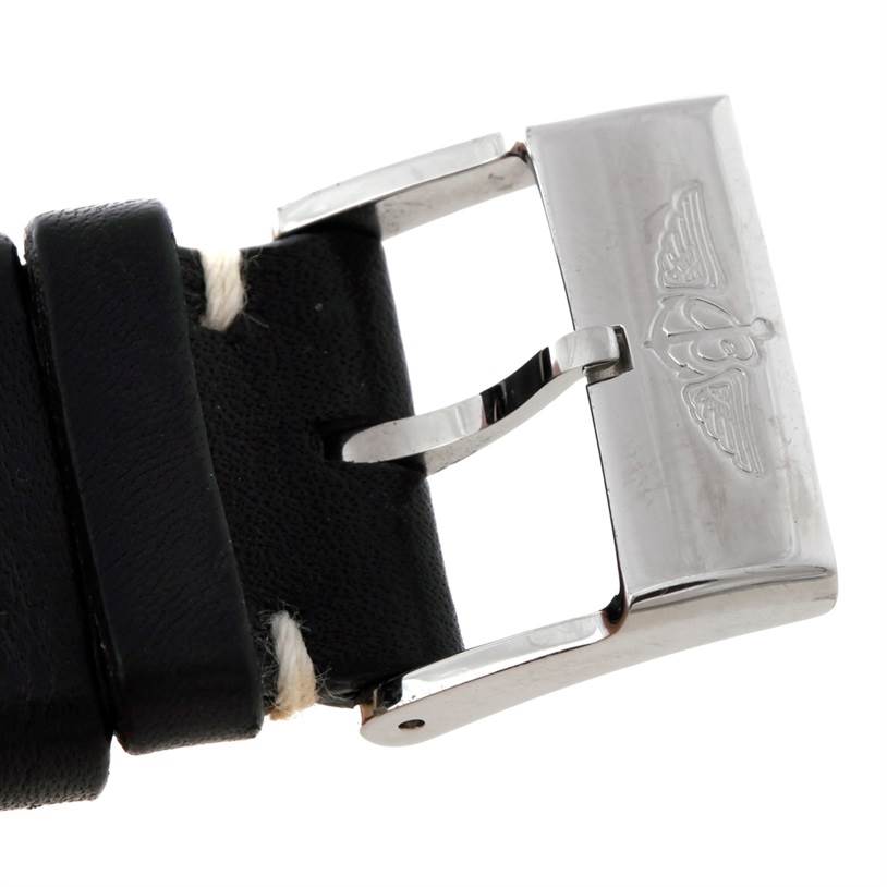 The image shows a close-up of the buckle and part of the leather strap of a Breitling Chronomat B13352 Men
s Steel and Gold (two tone) Black Dial B13352 Men
s Steel and Gold (two tone) Black Dial watch.