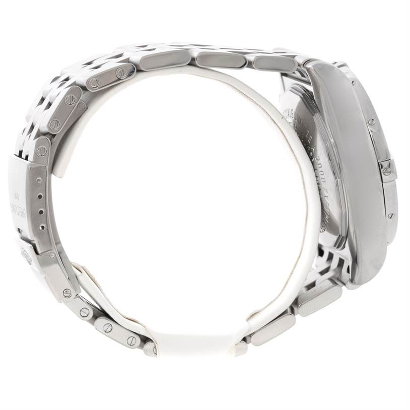 The image shows a side view of the Breitling Chronomat A44360 Men
s Stainless Steel Black Dial A44360 Men
s Stainless Steel Black Dial watch, specifically displaying its stainless steel bracelet and partially the case back.