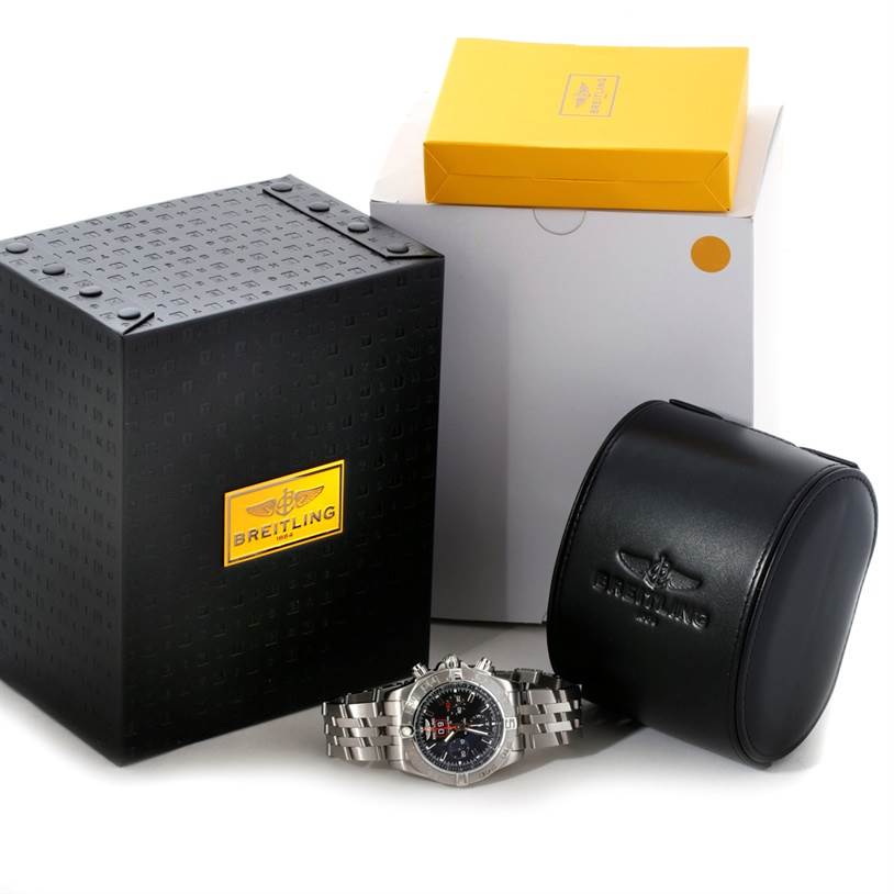 The image shows a Breitling Chronomat A44360 Men
s Stainless Steel Black Dial A44360 Men
s Stainless Steel Black Dial watch, packaging boxes, and a black leather case, viewed from a front angle.