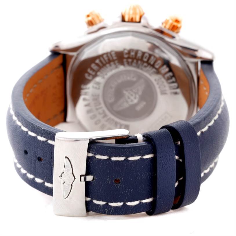 This image shows the back of a Breitling Chronomat C13356 Men
s Steel and Gold (two tone) White Dial C13356 Men
s Steel and Gold (two tone) White Dial watch, highlighting the case back, leather strap, and clasp.