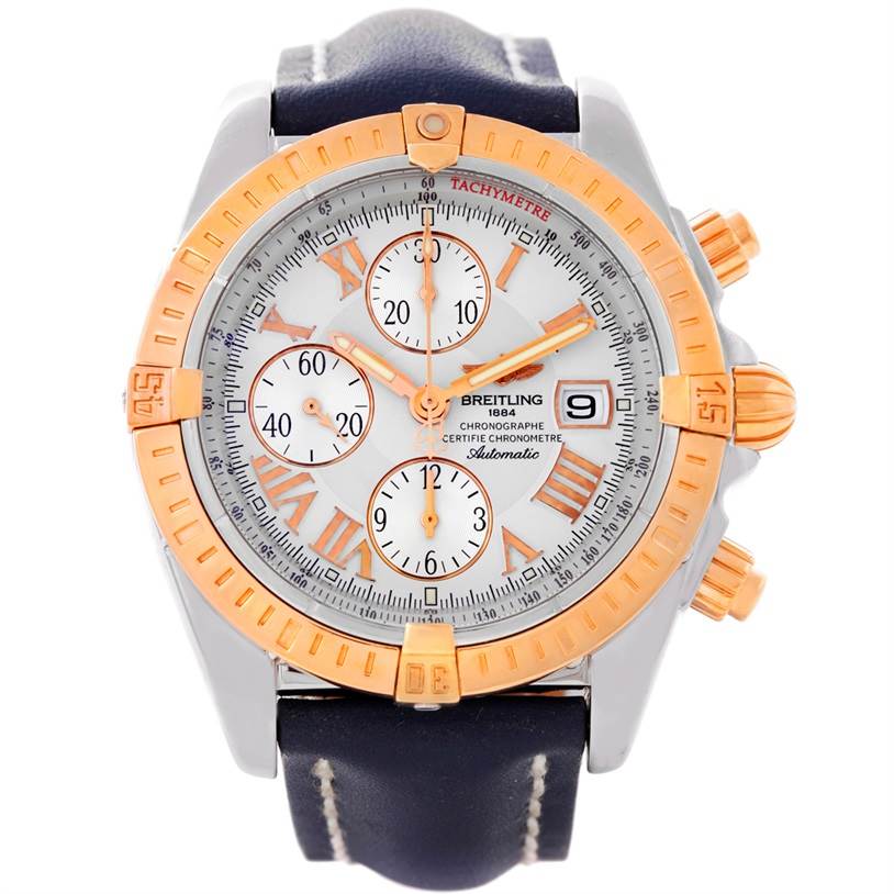 The image shows a front view of the Breitling Chronomat C13356 Men
s Steel and Gold (two tone) White Dial C13356 Men
s Steel and Gold (two tone) White Dial watch, displaying the dial, bezel, and leather strap.