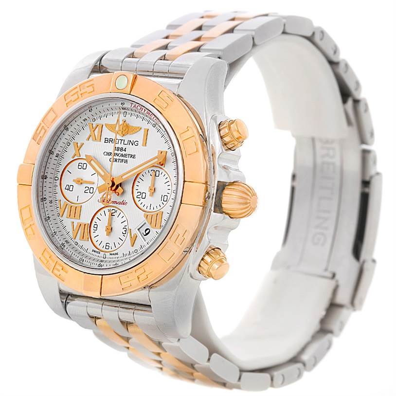 The Breitling Chronomat CB0140 Men's Steel and Gold (two tone) White Dial CB0140 Men's Steel and Gold (two tone) White Dial watch is shown at a slight angle, highlighting the face, bezel, and part of the bracelet.