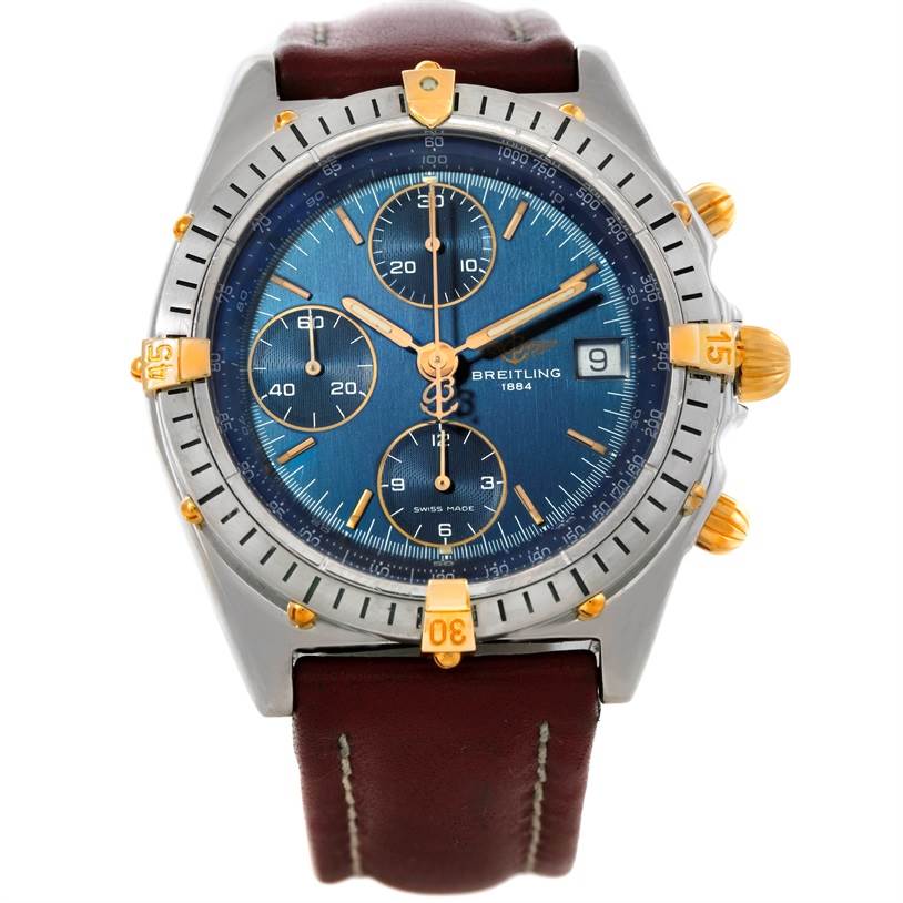 The image shows a front view of a Breitling Chronomat B13352 Men's Steel and Gold (two tone) Blue Dial B13352 Men's Steel and Gold (two tone) Blue Dial watch, highlighting its blue dial, subdials, steel case, and leather strap.