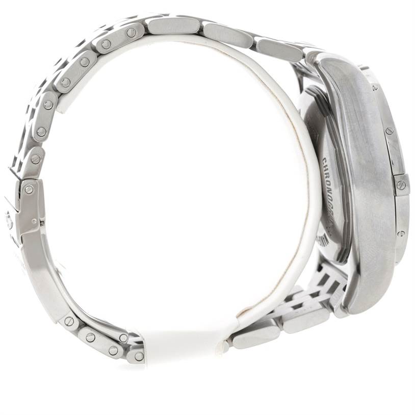 The image shows a side view of the Breitling Chronomat AB0410 Men's Stainless Steel Silver Dial AB0410 Men's Stainless Steel Silver Dial watch highlighting its metal bracelet and the side of its case.