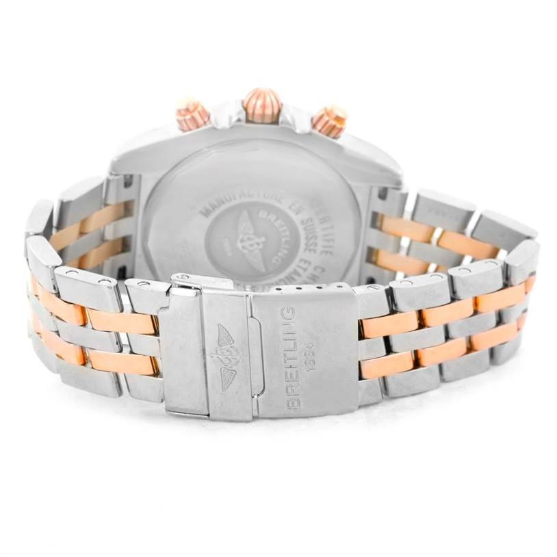 The image shows the back side and bracelet of a Breitling Chronomat C13356 Men's Steel and Gold (two tone) White Dial C13356 Men's Steel and Gold (two tone) White Dial watch, focusing on the clasp and case back. 