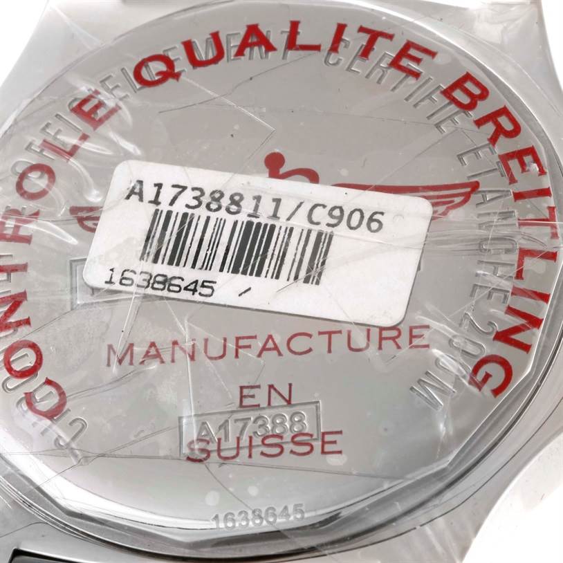 The image shows the backside of a Breitling Colt A17388 Men
s Stainless Steel Blue Dial A17388 Men
s Stainless Steel Blue Dial watch, including the model number and quality control sticker.