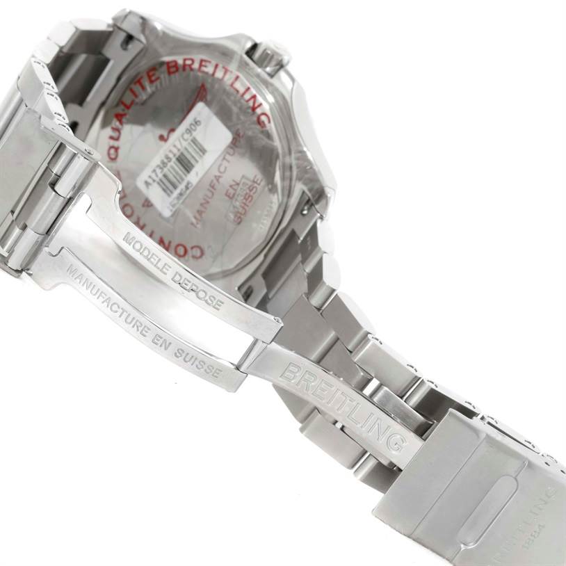 The image shows the rear case and stainless steel bracelet of a Breitling Colt A17388 Men
s Stainless Steel Blue Dial A17388 Men
s Stainless Steel Blue Dial model watch, highlighting its clasp and engraved details.