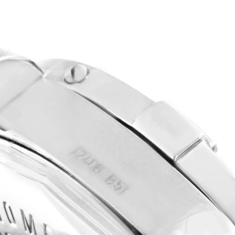 The image shows a close-up of the bracelet and caseback of the Breitling Colt A32350 Men's Stainless Steel Beige Dial A32350 Men's Stainless Steel Beige Dial model watch.