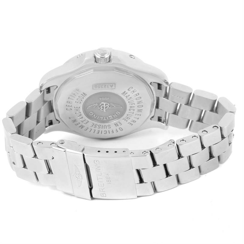 The image shows the backside and clasp of a Breitling Colt A32350 Men's Stainless Steel Beige Dial A32350 Men's Stainless Steel Beige Dial watch, featuring its metallic bracelet and engraved case back.