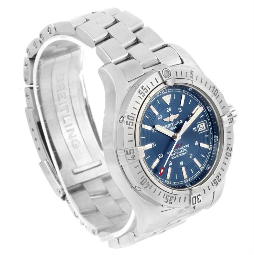 The image shows a Breitling Colt A17380 Men
s Stainless Steel Blue Dial A17380 Men
s Stainless Steel Blue Dial watch from a three-quarter angle, highlighting its blue dial, bezel, and metal bracelet.
