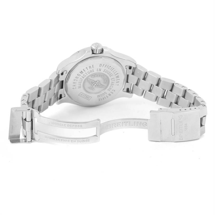 The image shows the back and clasp of a Breitling Colt A17380 Men
s Stainless Steel Blue Dial A17380 Men
s Stainless Steel Blue Dial watch, highlighting the case back and stainless steel bracelet.