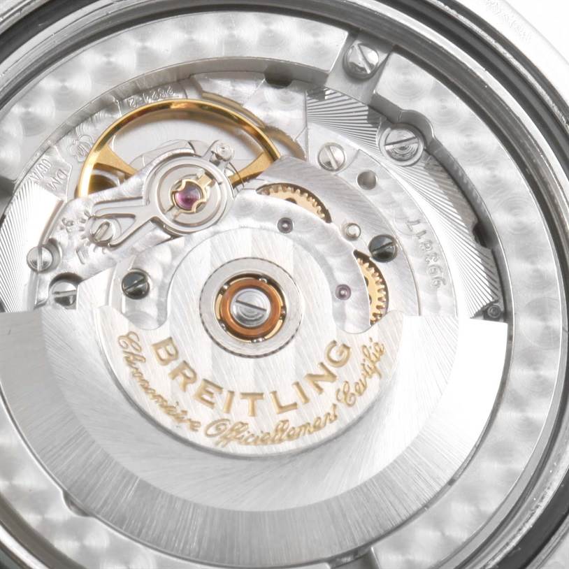 The image shows an angled view of the internal mechanism of a Breitling Colt A17380 Men
s Stainless Steel Blue Dial A17380 Men
s Stainless Steel Blue Dial watch, highlighting the rotor and gears.