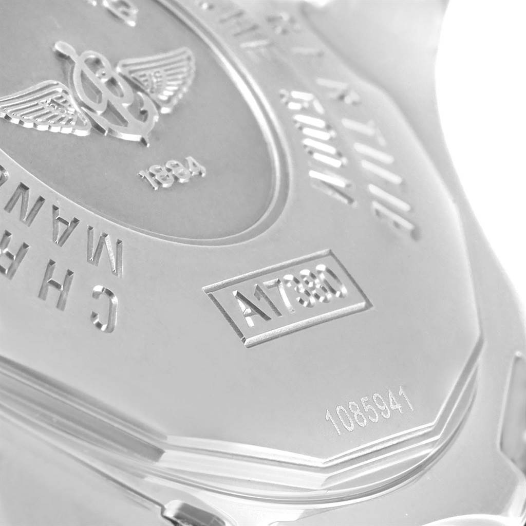 The image shows a close-up of the back case of a Breitling Colt A17380 Men
s Stainless Steel Silver Dial A17380 Men
s Stainless Steel Silver Dial watch, highlighting engravings and serial numbers.