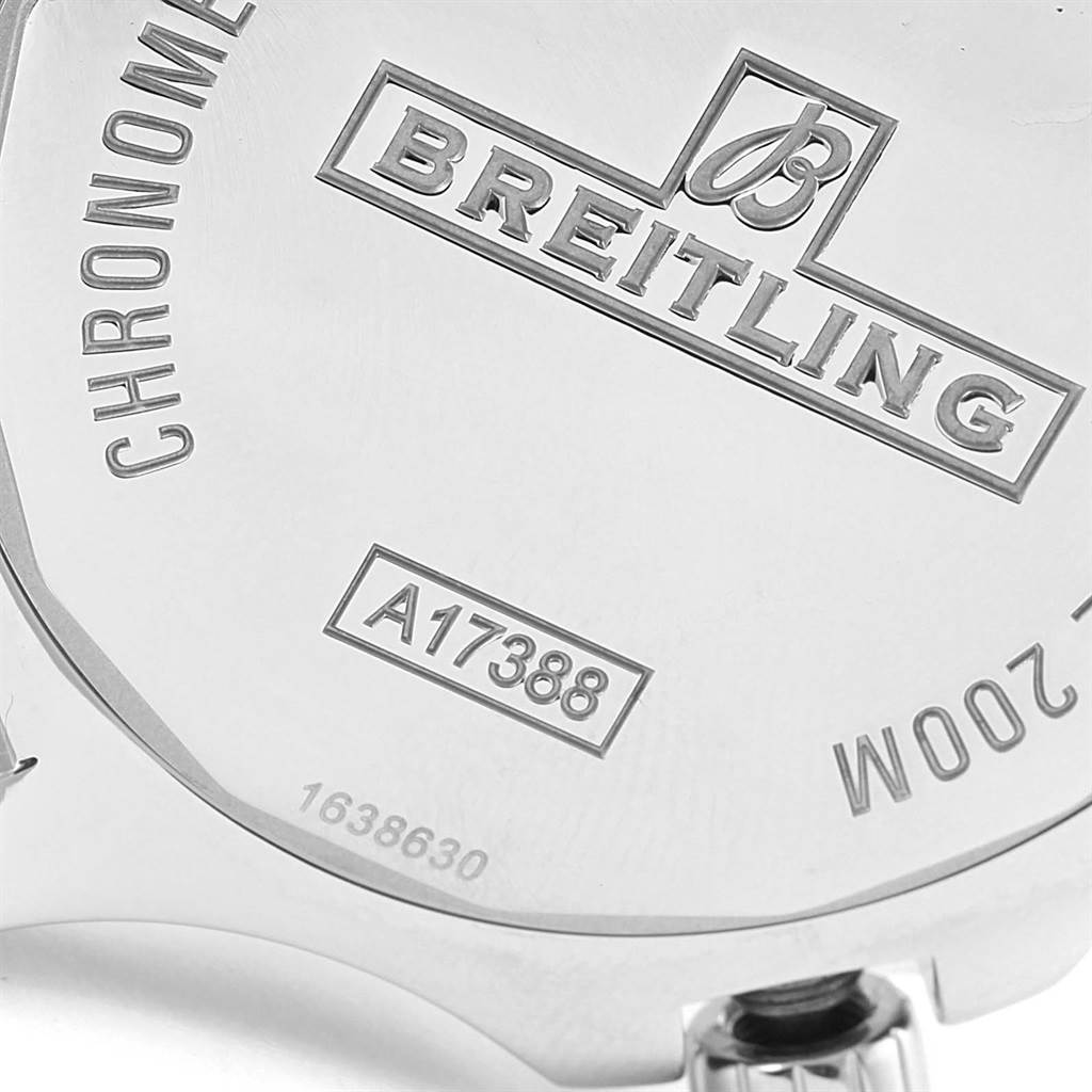 The image shows the back case and serial number of a Breitling Colt A17388 Men
s Stainless Steel Blue Dial A17388 Men
s Stainless Steel Blue Dial watch, including the crown.