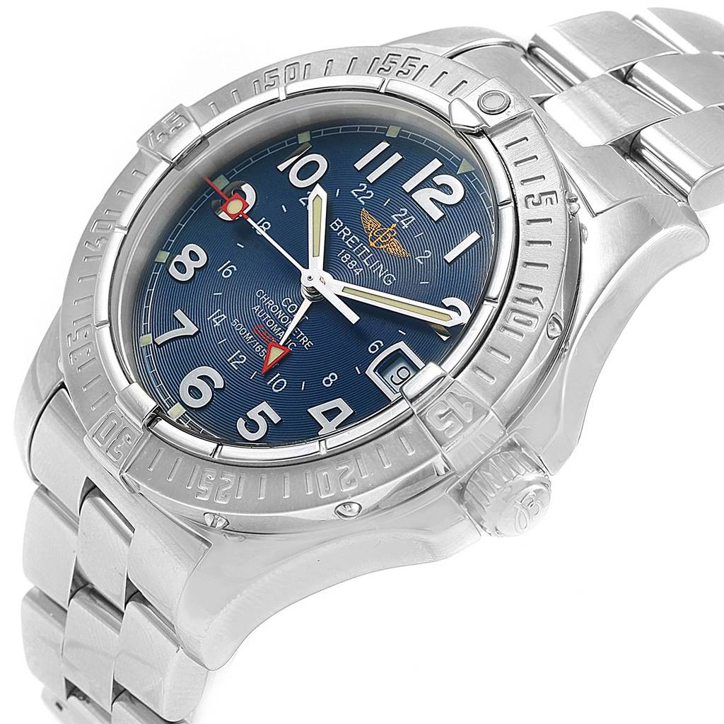 The Breitling Colt A32350 Men's Stainless Steel Blue Dial A32350 Men's Stainless Steel Blue Dial watch is viewed from an angle showing its face, bezel, crown, and stainless steel bracelet.
