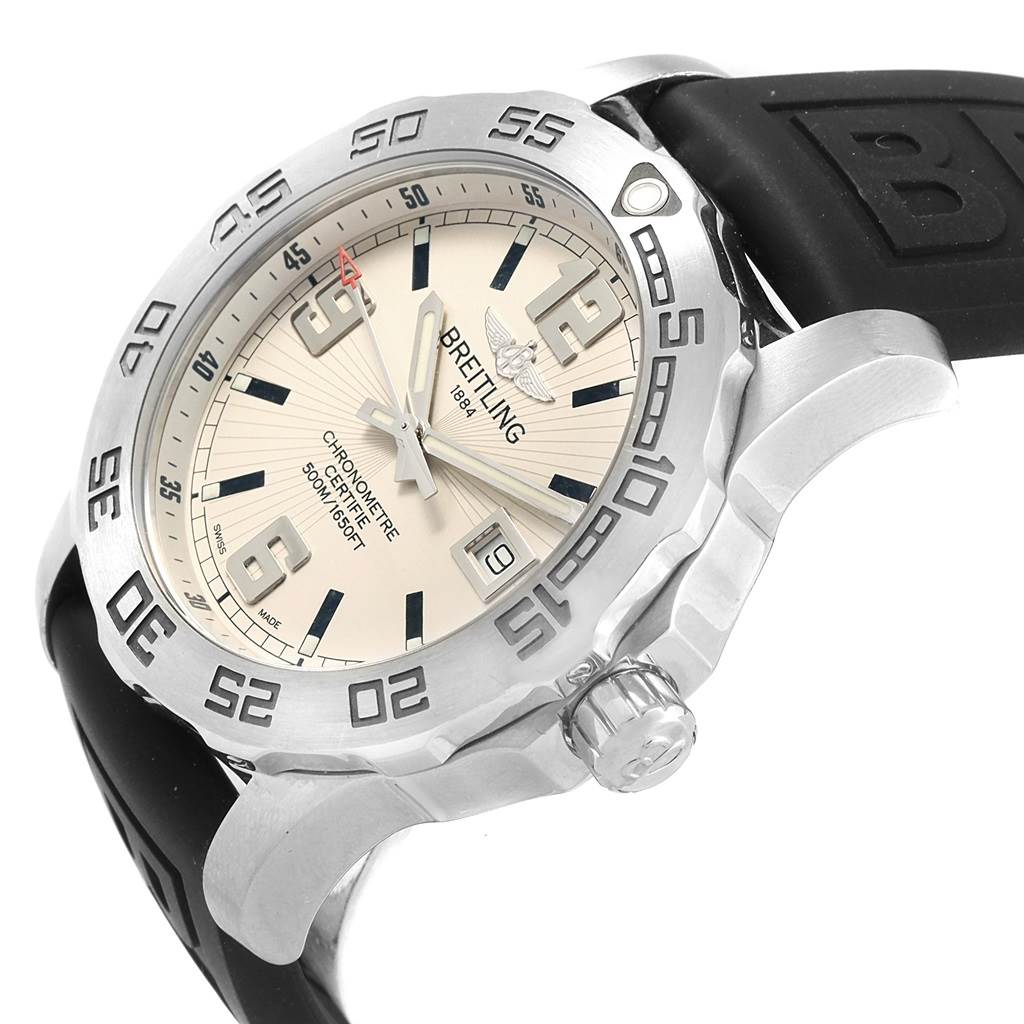 The image shows a close-up angle of a Breitling Colt A74387 Men's Stainless Steel Silver Dial A74387 Men's Stainless Steel Silver Dial watch, highlighting its bezel, dial, and crown.