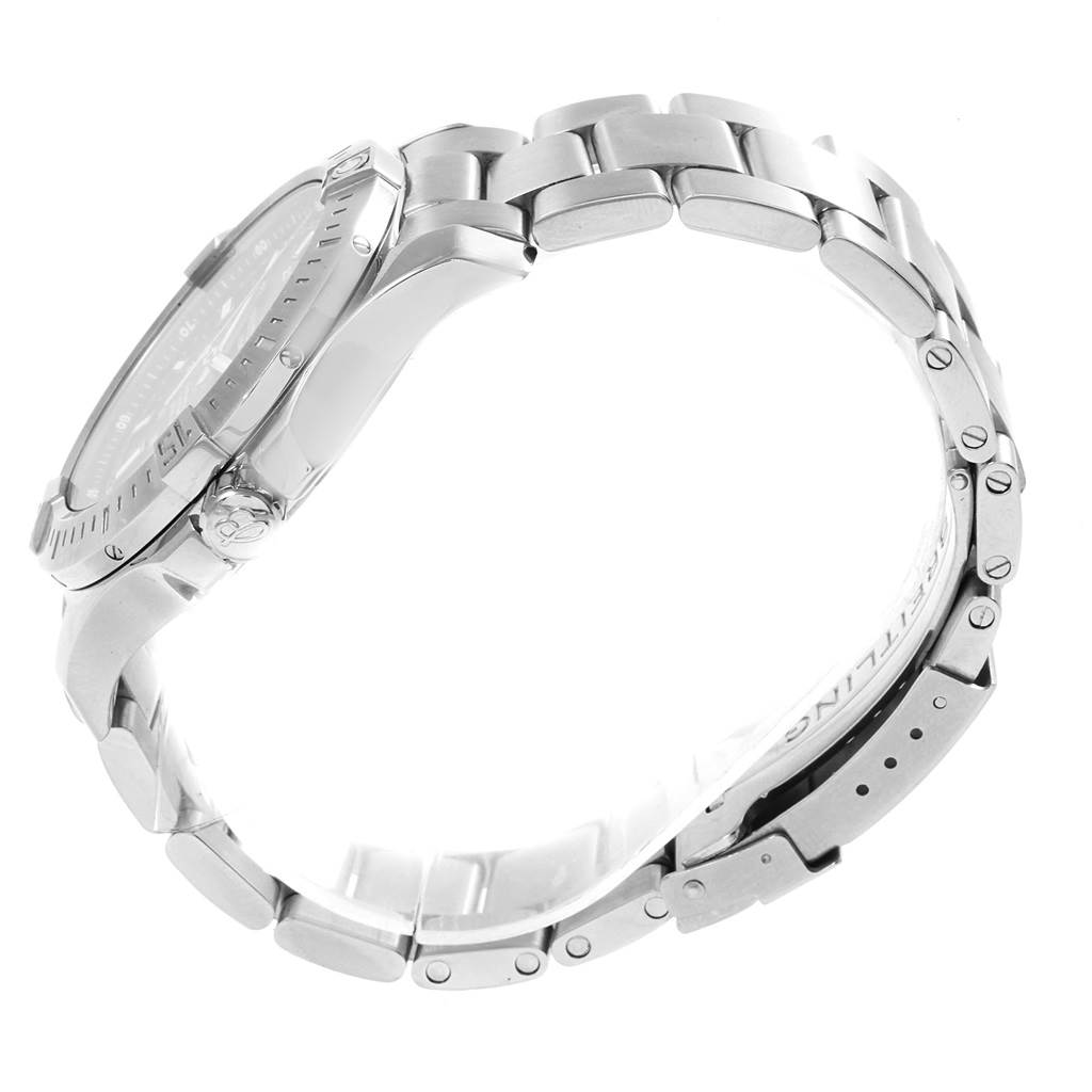 The image shows a side view of a Breitling Colt A17388 Men
s Stainless Steel Black Dial A17388 Men
s Stainless Steel Black Dial watch, focusing on its stainless steel bracelet and crown.