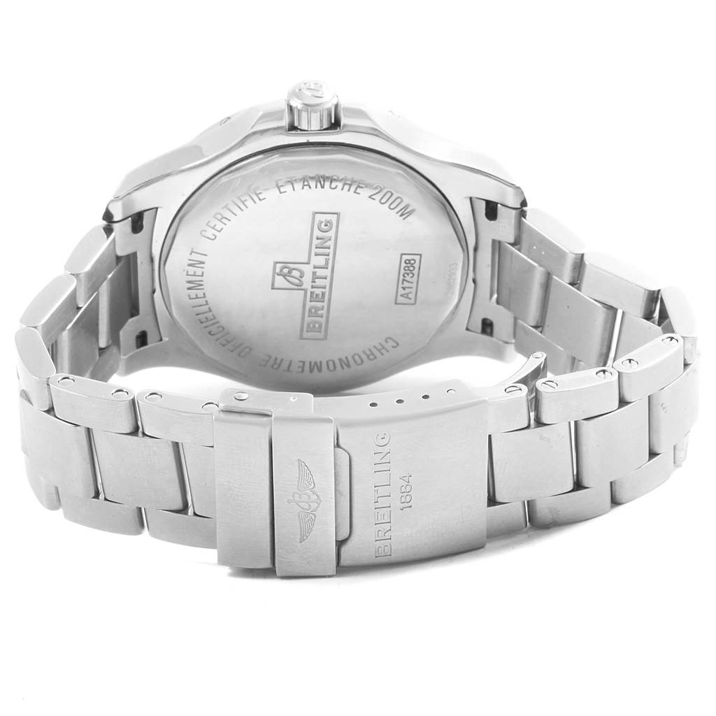 The image shows the back view of a Breitling Colt A17388 Men
s Stainless Steel Black Dial A17388 Men
s Stainless Steel Black Dial watch, highlighting the case back and metal bracelet with engraved clasp.