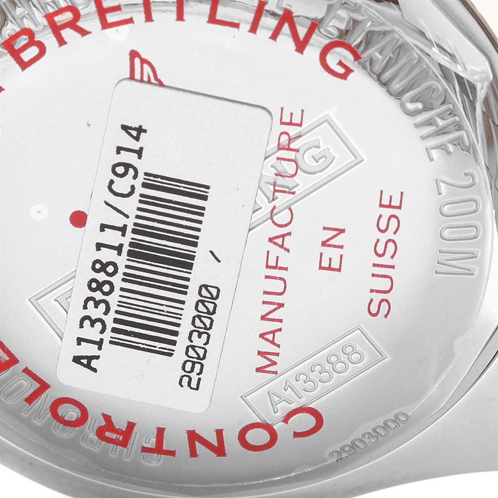 The image shows the back casing of a Breitling Colt A13388 Men's Stainless Steel Blue Dial A13388 Men's Stainless Steel Blue Dial watch with visible engravings and a barcode sticker.