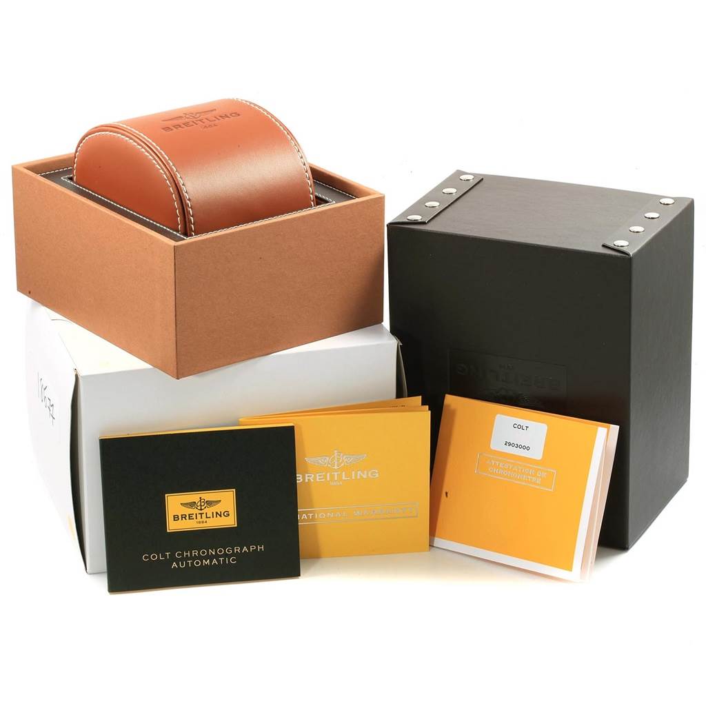 The image shows the packaging, manual, and accessories of the Breitling Colt A13388 Men's Stainless Steel Blue Dial A13388 Men's Stainless Steel Blue Dial watch from a frontal angle.