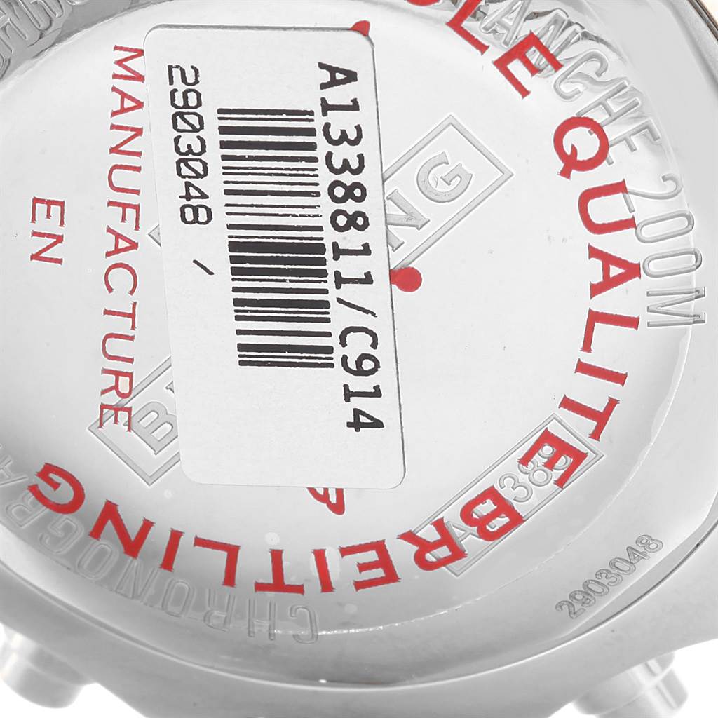 The image shows the back case of a Colt model watch by Breitling, displaying its model number and some text.