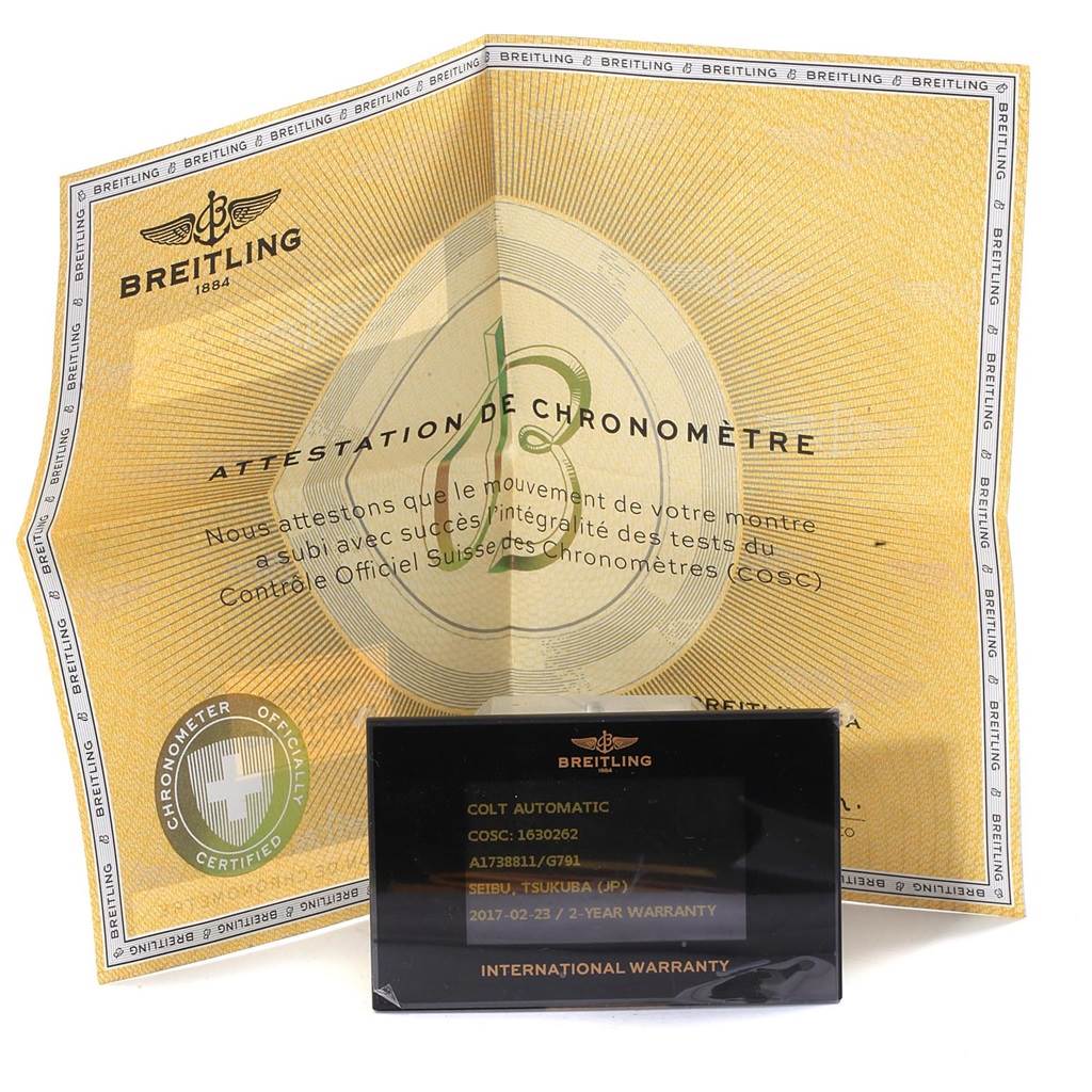 The image shows the certification and international warranty card for the Breitling Colt A17388 Men's Stainless Steel White Dial A17388 Men's Stainless Steel White Dial Automatic watch.
