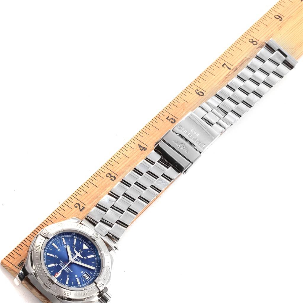 This image shows the face and stainless steel bracelet of a Breitling Colt A17380 Men's Stainless Steel Blue Dial A17380 Men's Stainless Steel Blue Dial watch with a measuring ruler for scale.