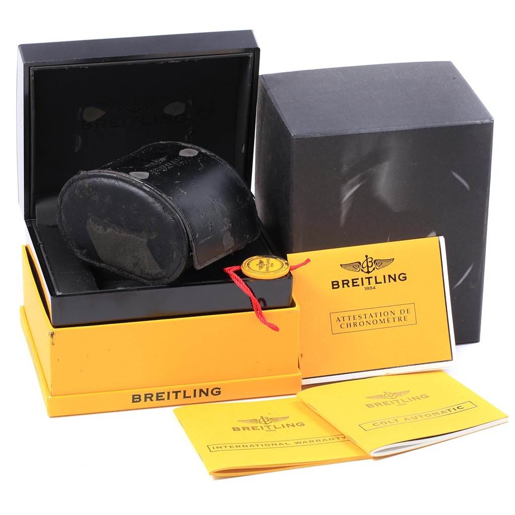 The image shows the box and documentation for a Breitling Colt A17380 Men's Stainless Steel Black Dial A17380 Men's Stainless Steel Black Dial watch, including the warranty and authentication papers.