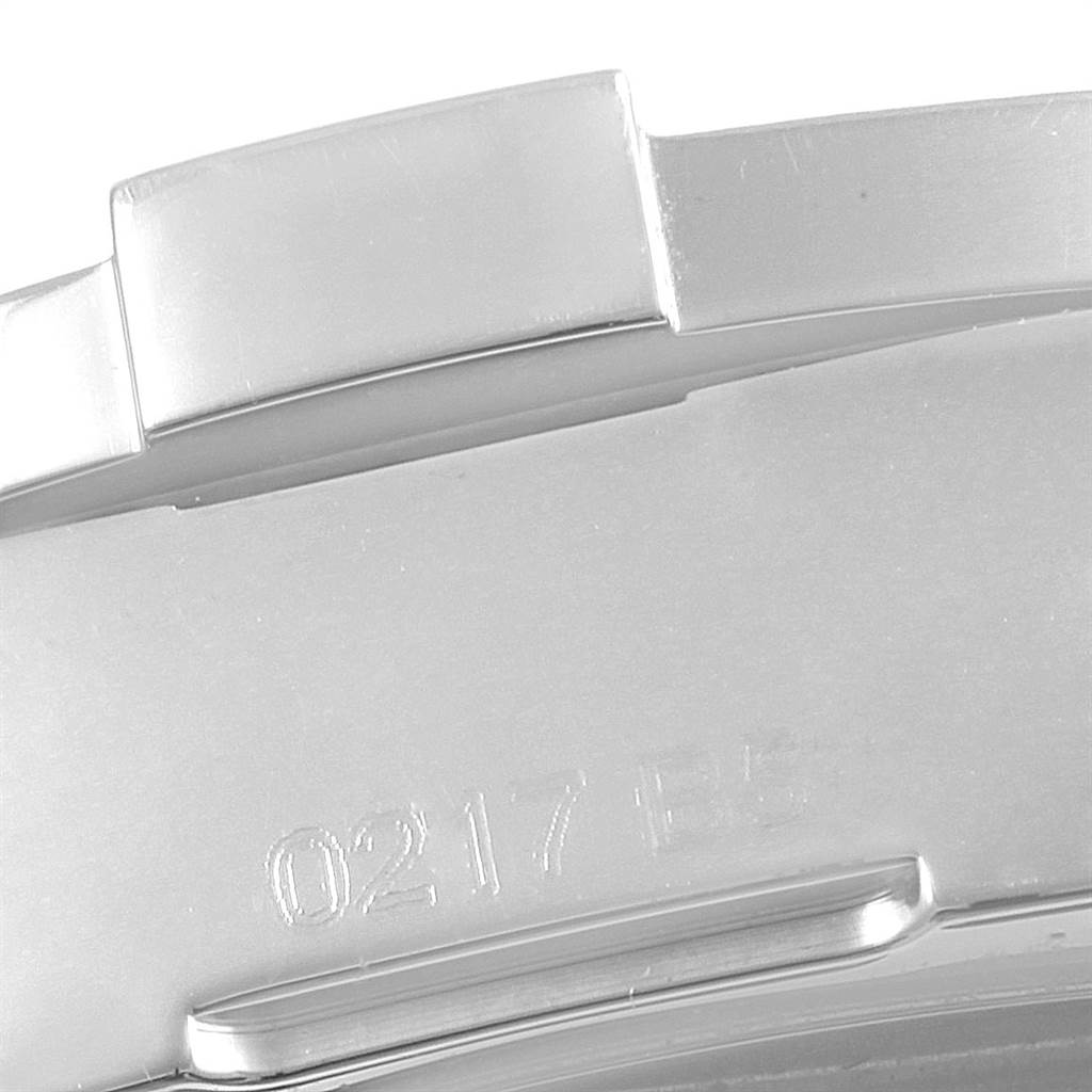 This image shows a close-up view of the engraved serial number on the case back of a Breitling Colt A74388 Men's Stainless Steel Blue Dial A74388 Men's Stainless Steel Blue Dial watch.
