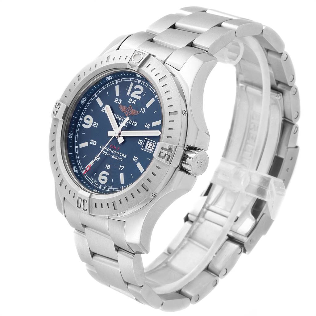 The image shows a side angle of the Breitling Colt A74388 Men's Stainless Steel Blue Dial A74388 Men's Stainless Steel Blue Dial watch, highlighting its blue face, bezel, crown, and metal bracelet.