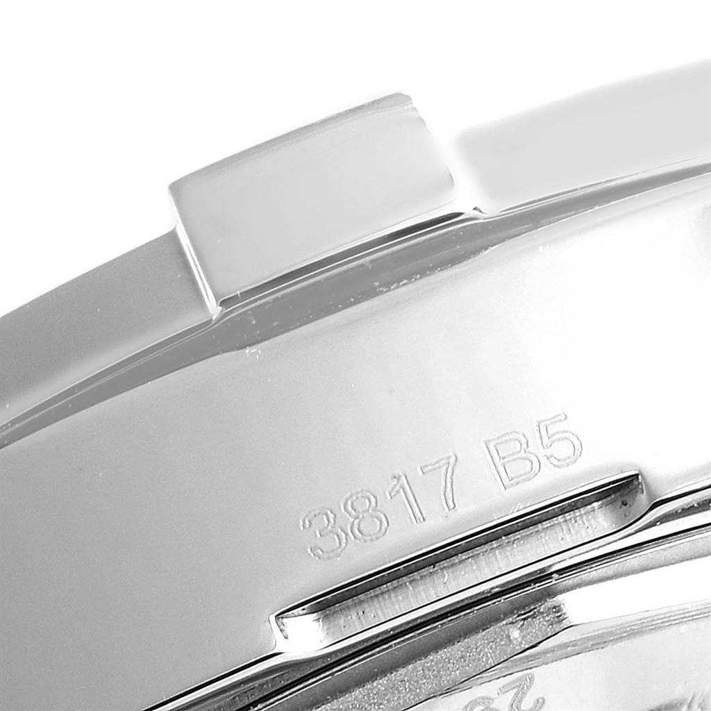 This close-up image shows the engraved details on the metal case back of the Breitling Colt A17388 Men's Stainless Steel Blue Dial A17388 Men's Stainless Steel Blue Dial watch.