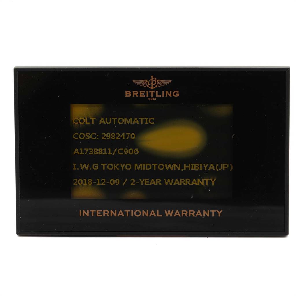 The image shows an International Warranty card for the Breitling Colt A17388 Men's Stainless Steel Blue Dial A17388 Men's Stainless Steel Blue Dial Automatic model, listing details like COSC, model number, and date of warranty.