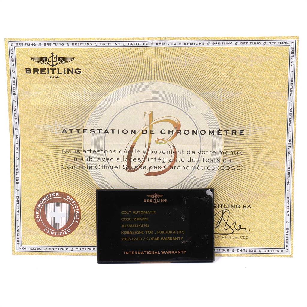 The image shows the Breitling Colt A17388 Men's Stainless Steel White Dial A17388 Men's Stainless Steel White Dial model's warranty card and certificate at a straight-on angle.