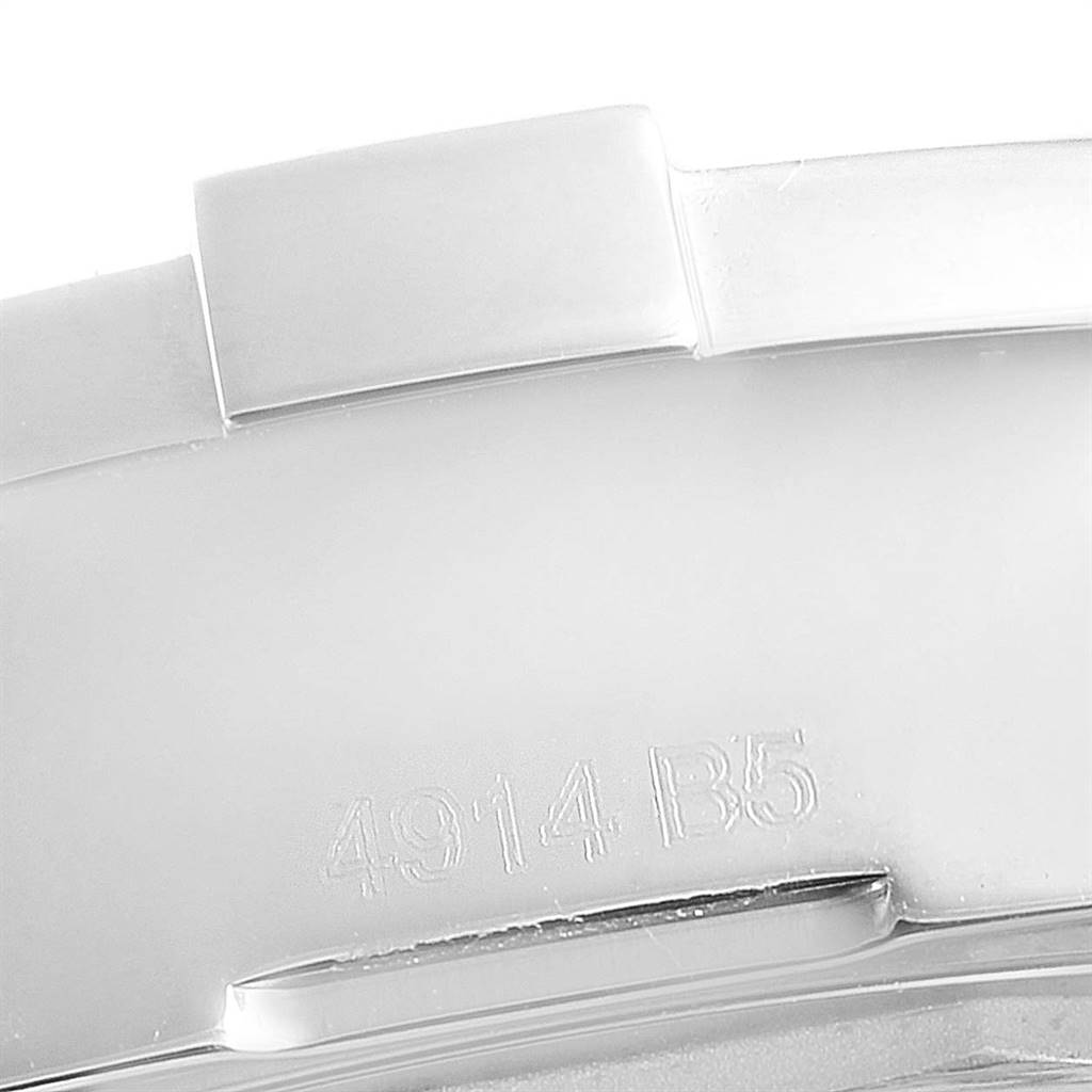 This is a close-up of the back of a Breitling Colt A17388 Men's Stainless Steel White Dial A17388 Men's Stainless Steel White Dial watch, showing part of the band and the model number "4914 B5".