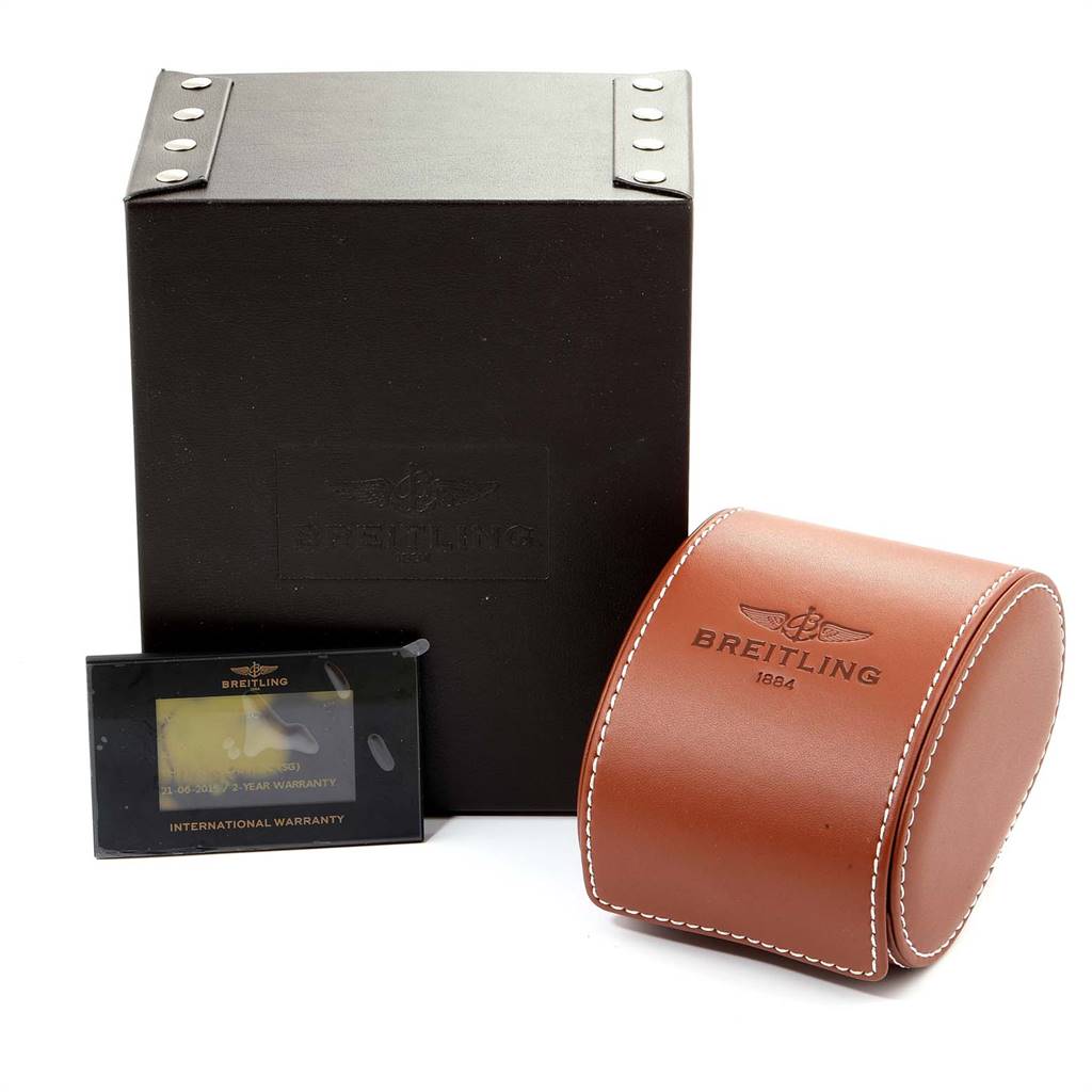 The image shows the packaging and warranty card for the Breitling Colt A17388 Men's Stainless Steel White Dial A17388 Men's Stainless Steel White Dial model, including a brown leather case and a black box.