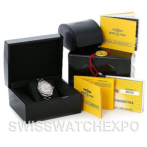 The image shows a Breitling Colt A17380 Stainless Steel Silver Dial A17380 Stainless Steel Silver Dial watch at a slight angle in its box, accompanied by documentation, warranty card, and additional packaging.