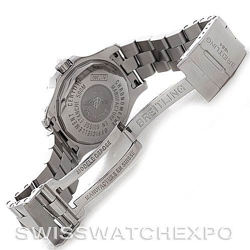 The image shows the back case and open clasp of a Breitling Colt A17380 Men's Stainless Steel Blue Dial A17380 Men's Stainless Steel Blue Dial watch, revealing the engravings and bracelet.