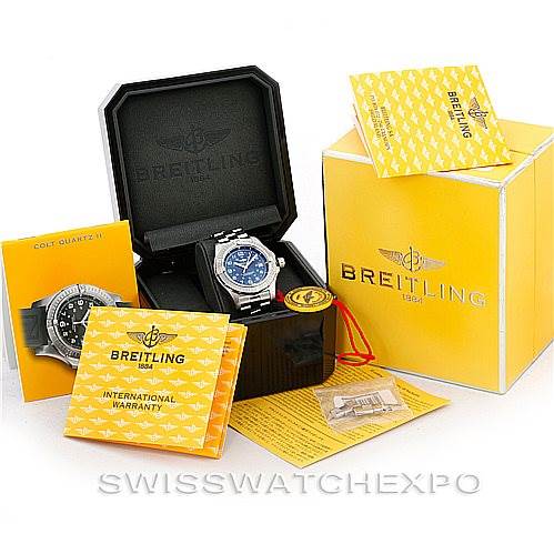 The image shows the Breitling Colt A74380 Men's Stainless Steel Blue Dial A74380 Men's Stainless Steel Blue Dial watch from an overhead angle, including its box, papers, and accessories.