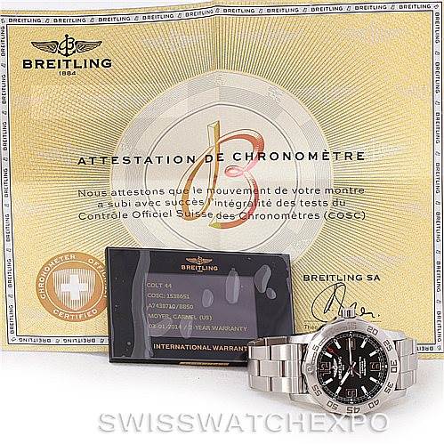 The image shows a Breitling Colt A74387 Men
s Stainless Steel Black Dial A74387 Men
s Stainless Steel Black Dial watch with a stainless steel bracelet, warranty card, and chronometer certificate, viewed from the front.