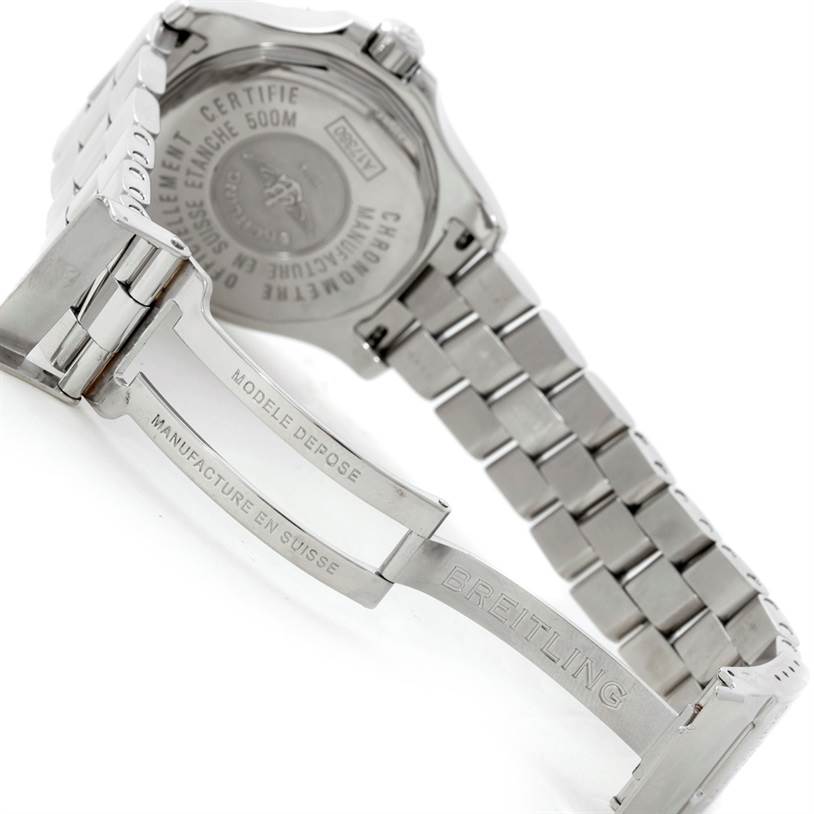 The image shows the back and clasp of a Breitling Colt A17380 Men
s Stainless Steel Silver Dial A17380 Men
s Stainless Steel Silver Dial watch, highlighting the engravings and metal bracelet.