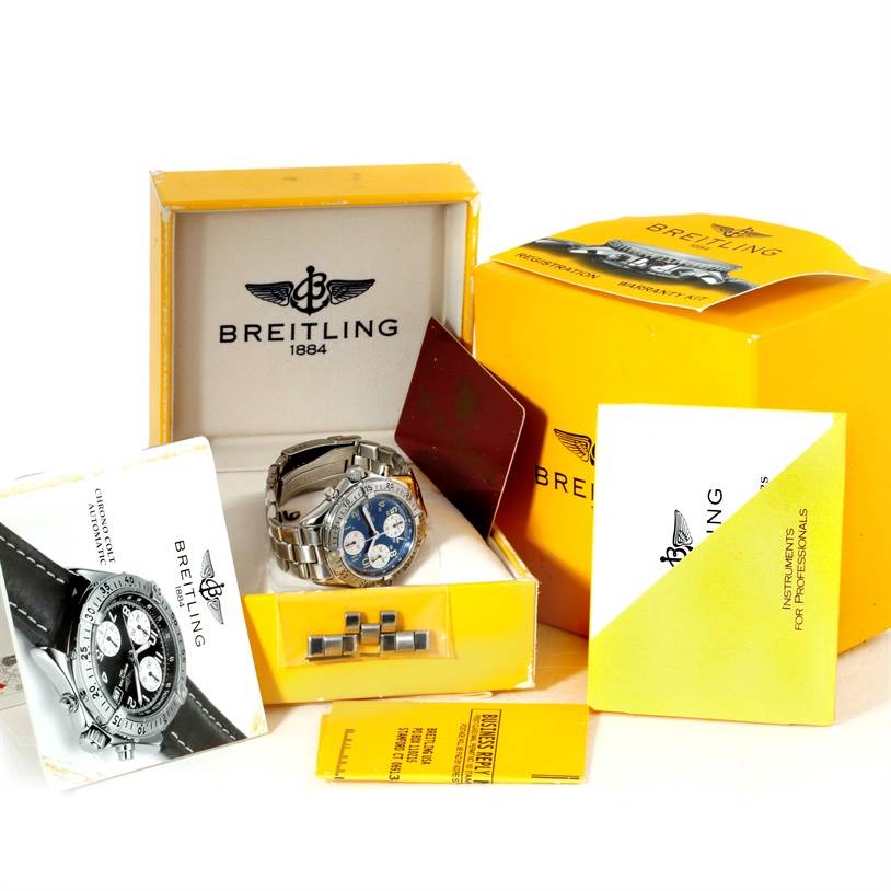 The Breitling Colt A13035 Men's Stainless Steel Blue Dial A13035 Men's Stainless Steel Blue Dial watch is displayed mostly front-facing, showing its case, bracelet, and additional links, alongside the packaging and manuals.