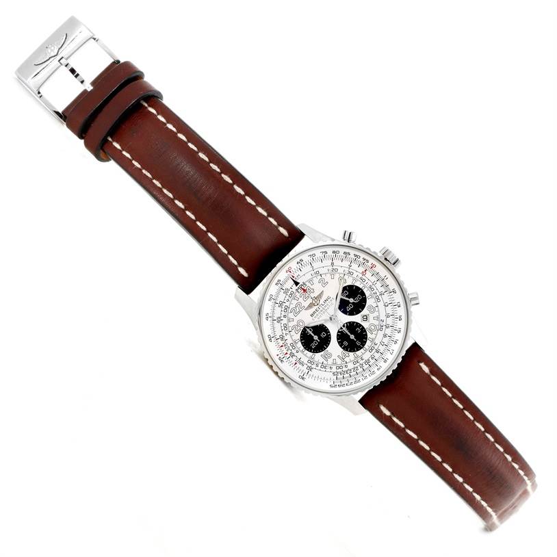 The Breitling Navitimer A22322 Men
s Stainless Steel Silver Dial A22322 Men
s Stainless Steel Silver Dial watch is shown from a top-down angle, highlighting its face, brown leather strap, and stainless steel buckle.
