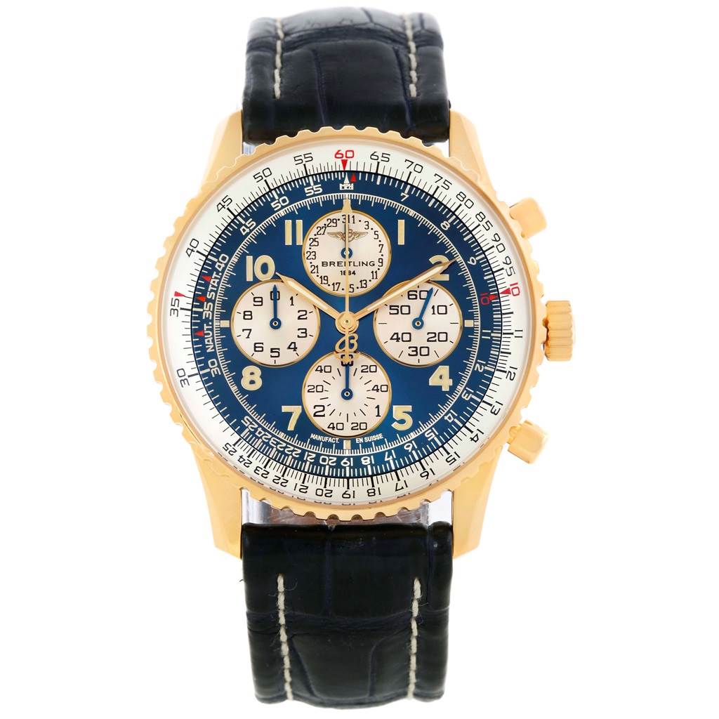 This is a frontal view of a Breitling Navitimer K33030 Men
s Yellow Gold Blue Dial K33030 Men
s Yellow Gold Blue Dial watch showing its face, bezel, pushers, and leather strap.