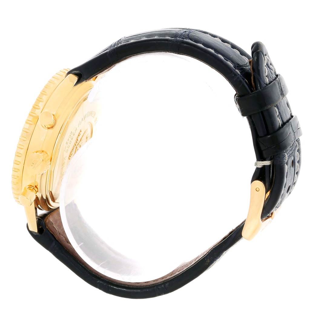 This image shows a side view of a Breitling Navitimer K33030 Men
s Yellow Gold Blue Dial K33030 Men
s Yellow Gold Blue Dial watch, highlighting its gold case and black leather strap.