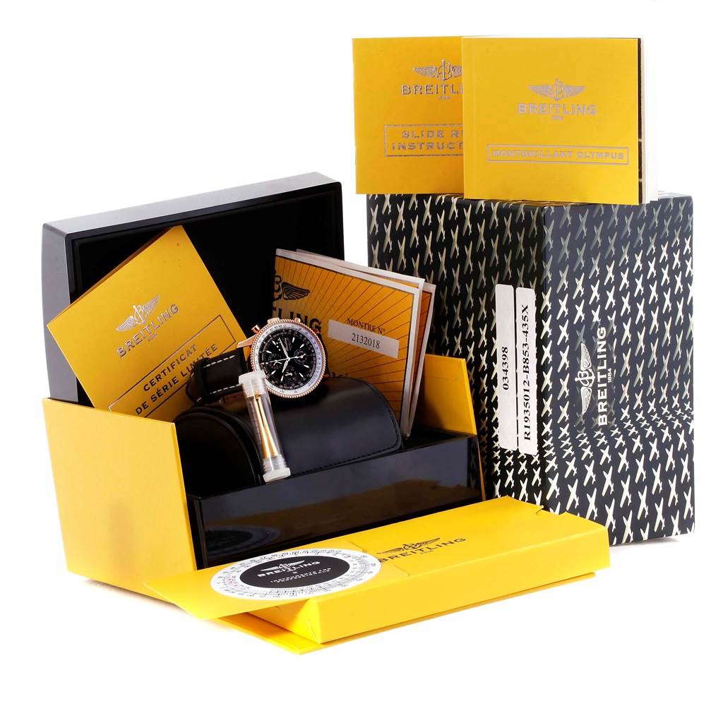 This image shows a Breitling Navitimer R19350 Men's Rose Gold Black Dial R19350 Men's Rose Gold Black Dial watch along with its box, certificate, manuals, and packaging materials.