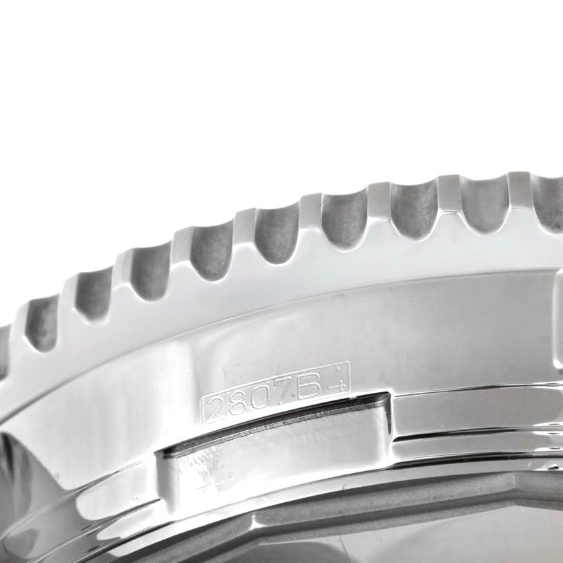 This image shows a close-up of the bezel and part of the case of a Breitling Navitimer A24322 Men's Stainless Steel Silver Dial A24322 Men's Stainless Steel Silver Dial watch.