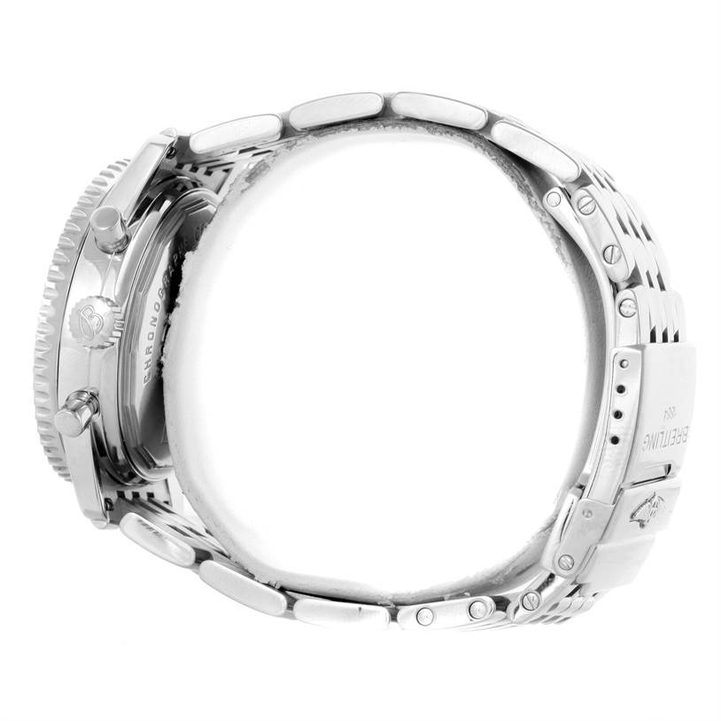 The image shows a side view of a Breitling Navitimer A41370 Men
s Stainless Steel Brown Dial A41370 Men
s Stainless Steel Brown Dial watch, highlighting the crown, pushers, case, and metal bracelet.