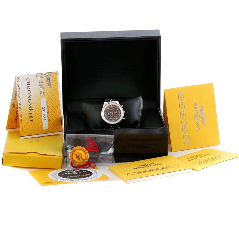 The image shows a Breitling Navitimer A41370 Men
s Stainless Steel Brown Dial A41370 Men
s Stainless Steel Brown Dial watch in its box, with accompanying manuals, certificates, and accessories.