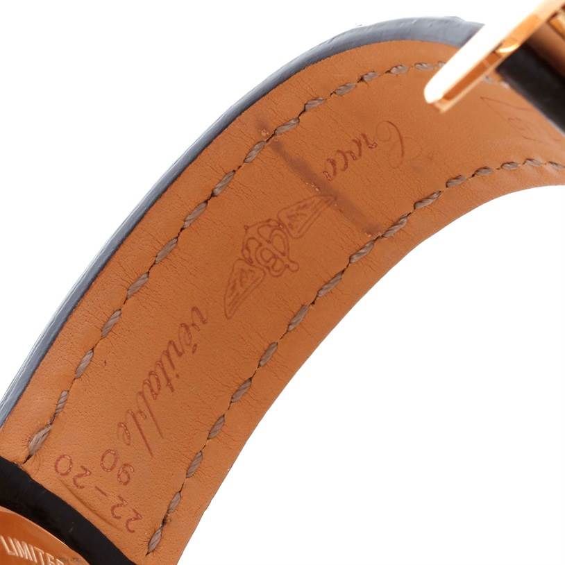 This image shows the underside of a leather strap for the Breitling Navitimer R26322 Men's Rose Gold Black Dial R26322 Men's Rose Gold Black Dial watch, highlighting the brand's logo and stitching.
